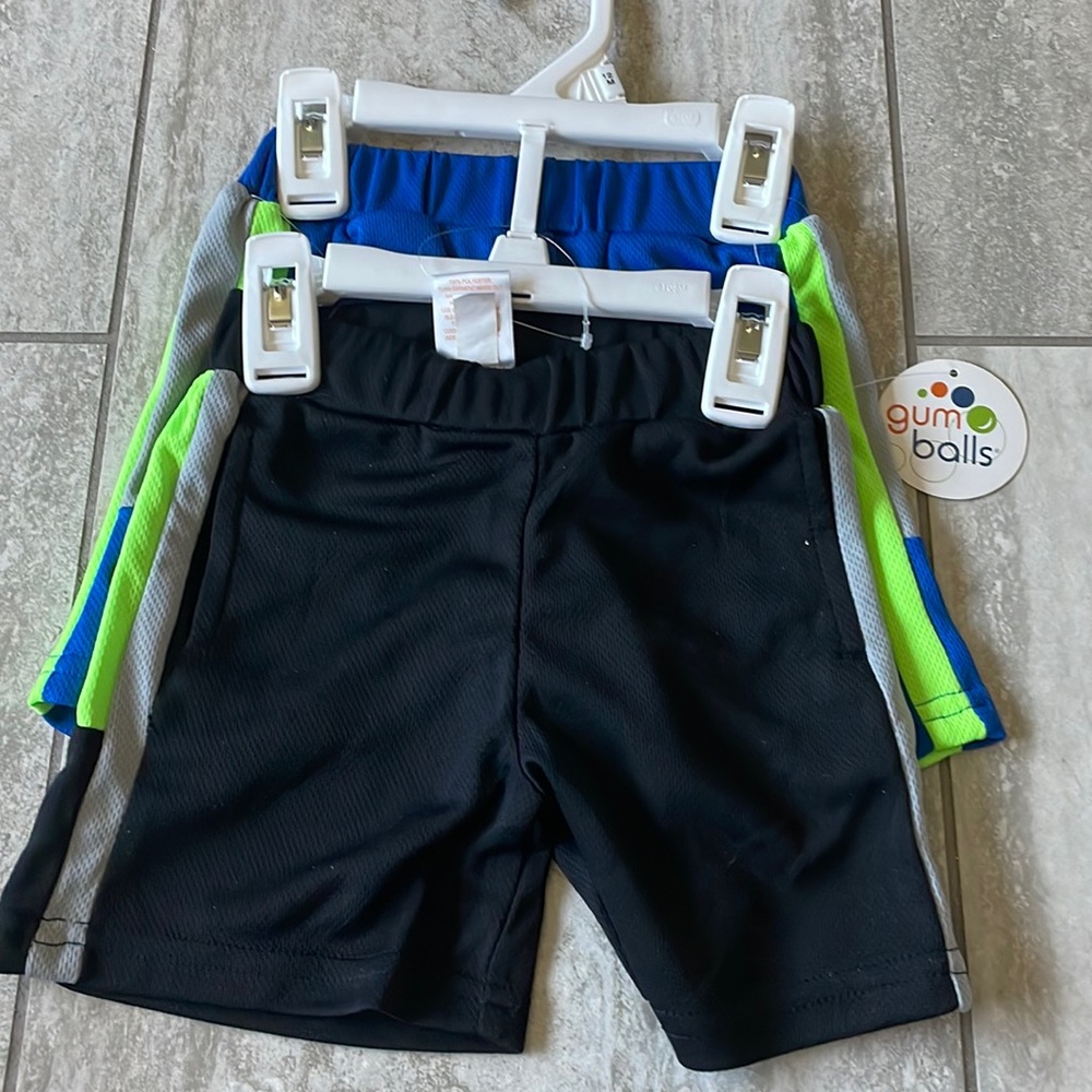pair of gumballs short,blue and black,12M, with elastic waist band